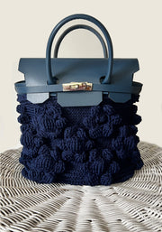 Sac cuir et fleurs
