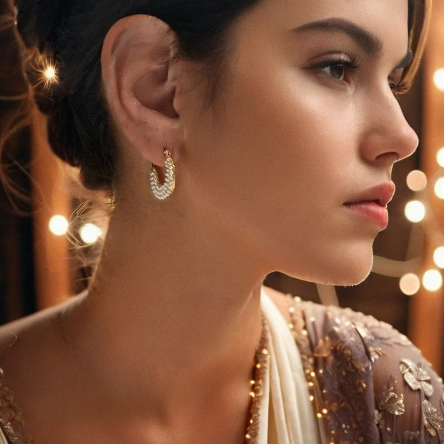 Demi lune dorée et perles